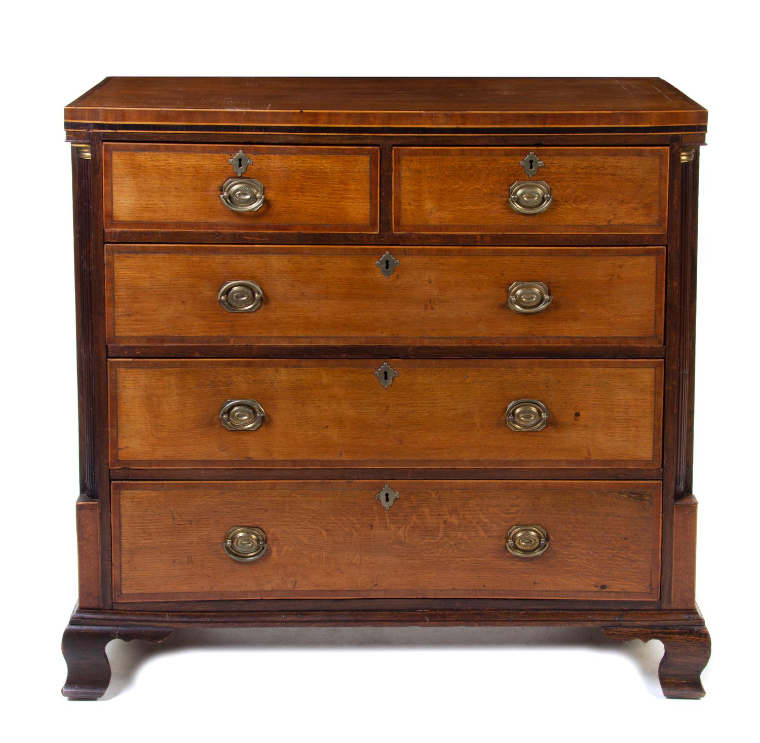 A George III Oak and Mahogany Chest of Drawers Height 43 1/2 x width 45 1/8 x depth 17 3/4 inches. — 19TH CENTURY