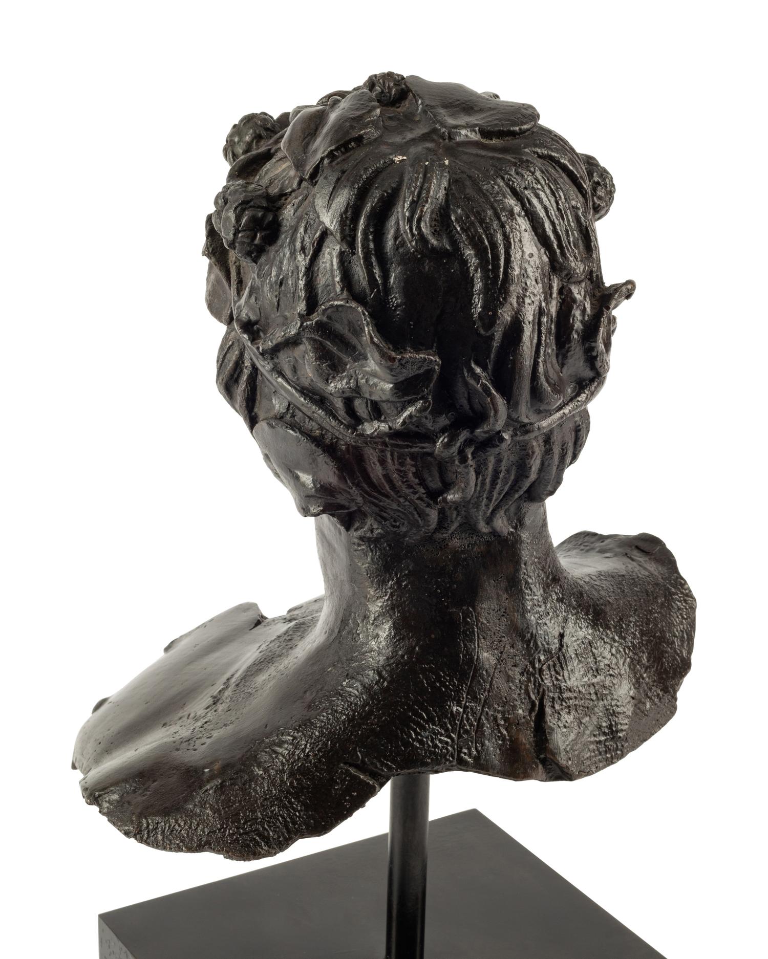 A Continental Bronze Head of Bacchus