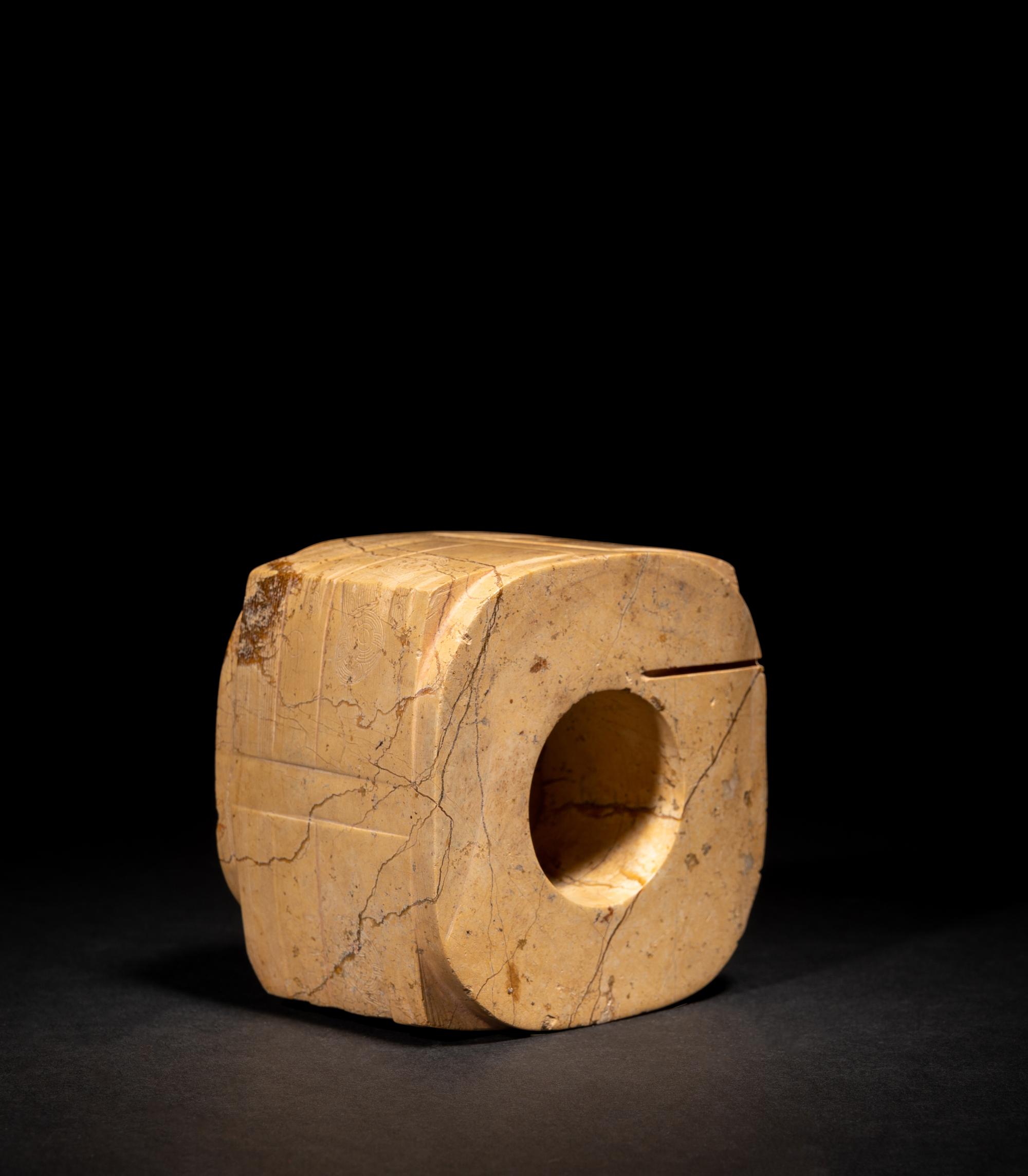 A Chinese Archaistic Chicken Bone Jade Cong