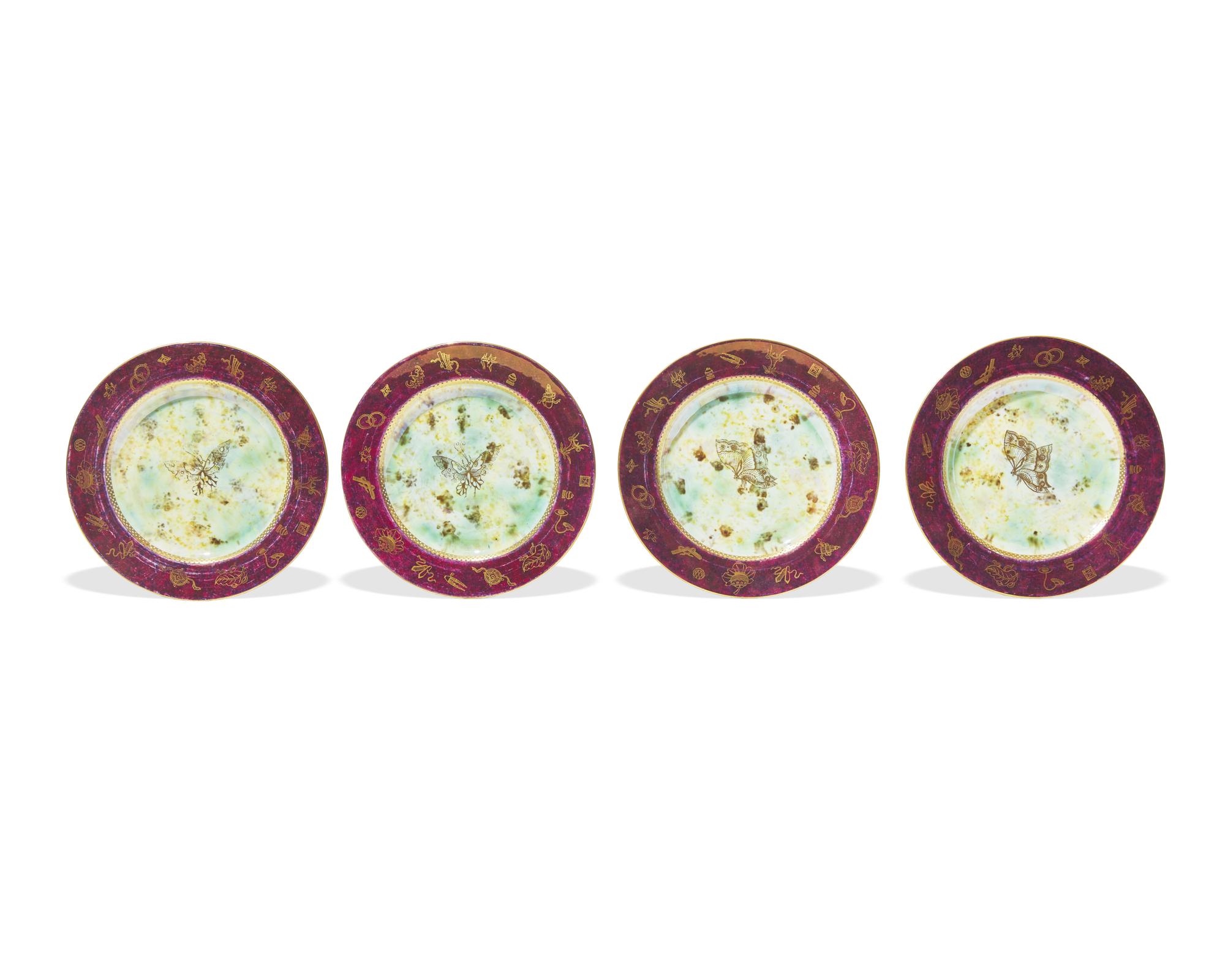 A Set of Four Wedgwood Lustreware Plates