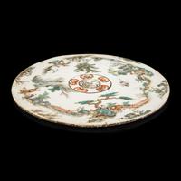 A Chinese Famille Rose Porcelain Circular Plaque, Second Half of 19th Century — 清晚期 粉彩行樂圖圓瓷板