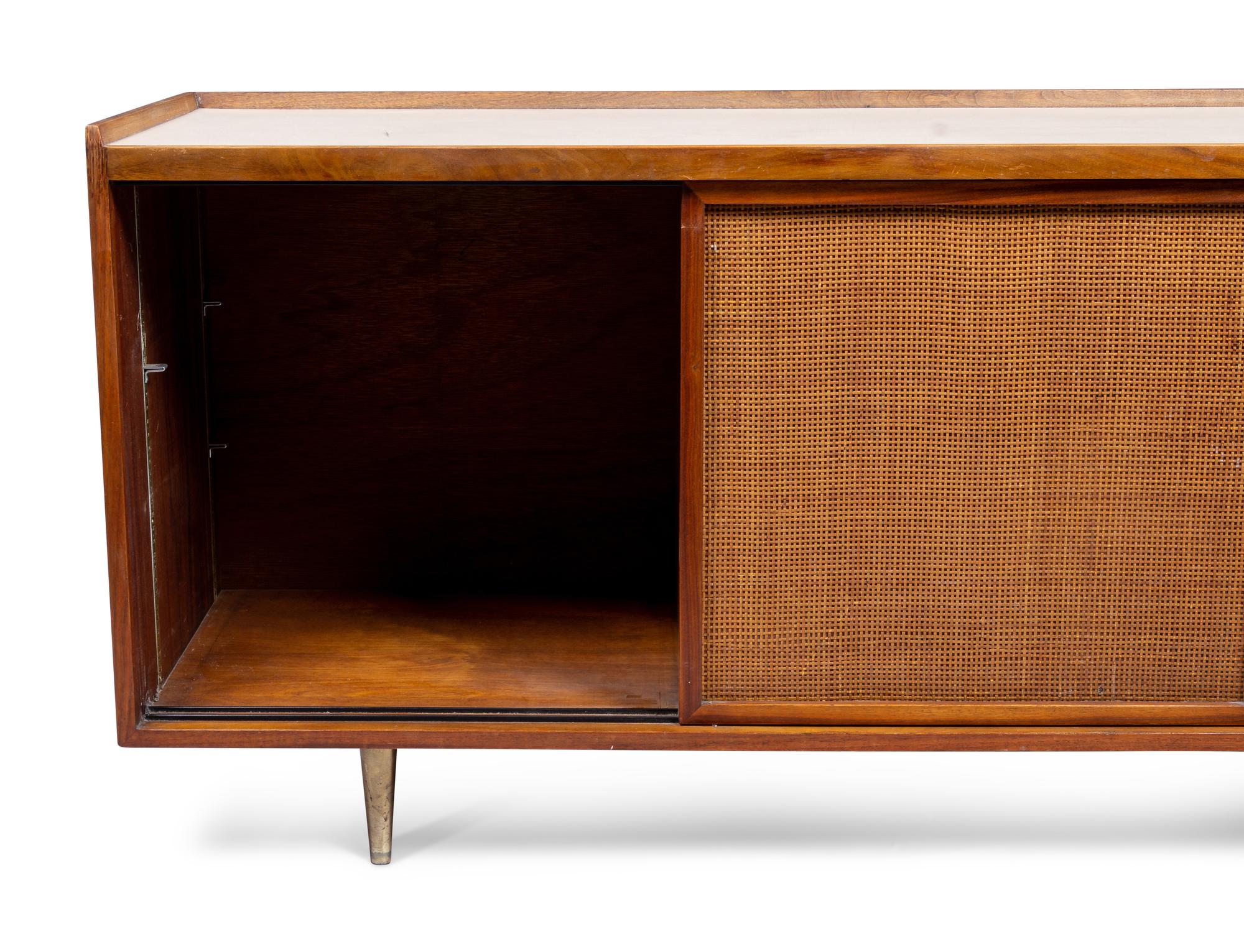 A Founders Furniture Co. Walnut, Caned and Laminte-Top Credenza
