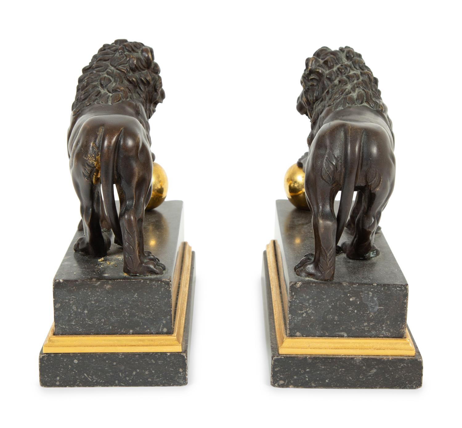 A Pair of Continental Patinated and Gilt Bronze Medici Lions