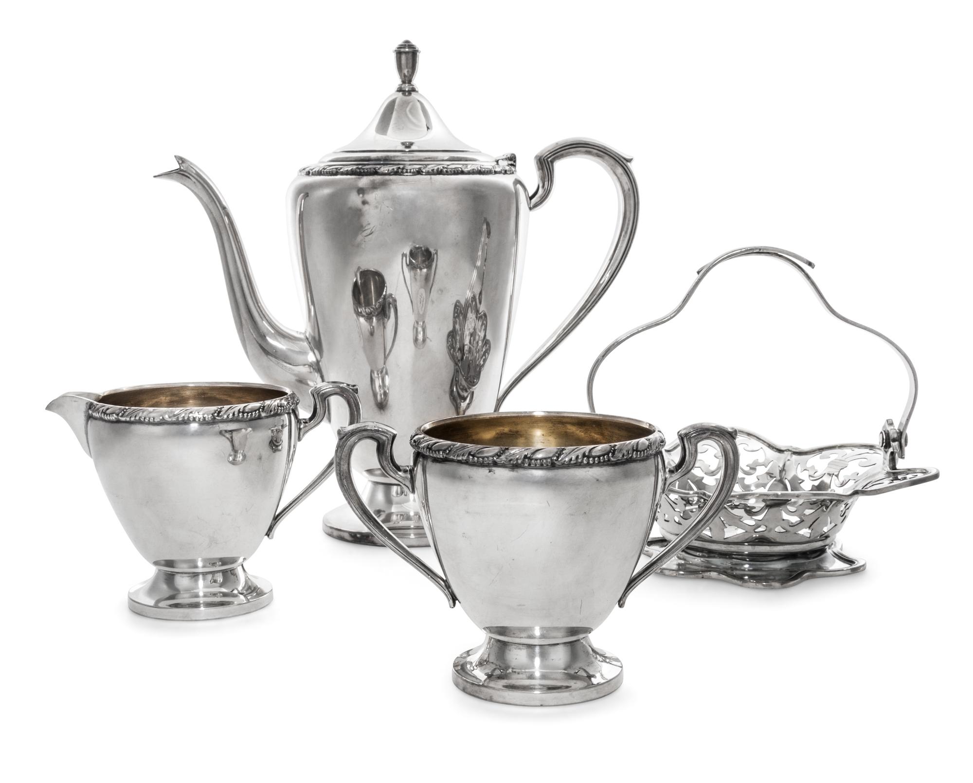 An American Silver-Plate Tea Service, Wm. Rogers, 20th Century, Andover pattern, comprising a teapot, a creamer and a sugar; together w