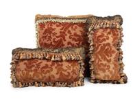 A Set of Three Velvet Upholstered Pillows with Tassels