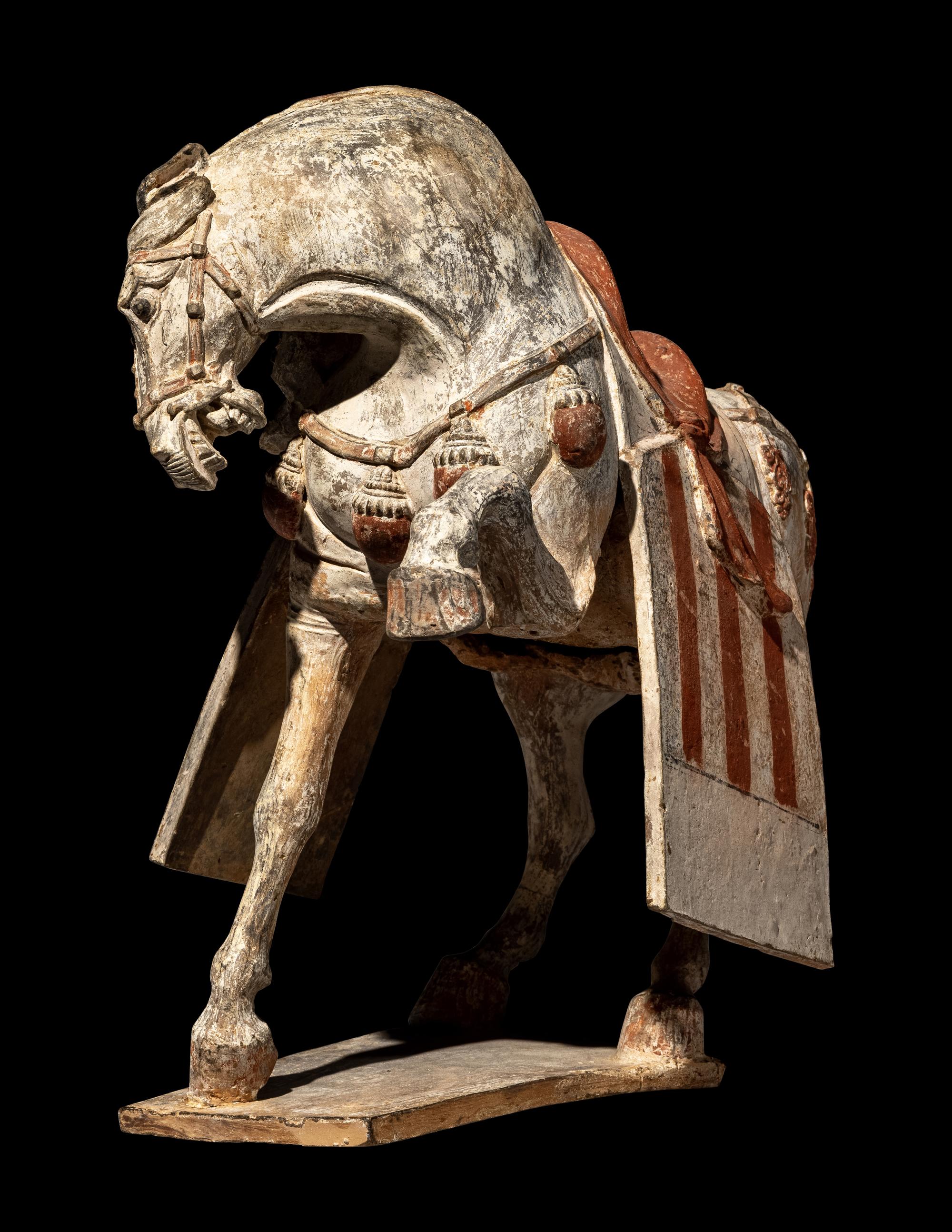 A Chinese Painted Pottery Figure of a Horse