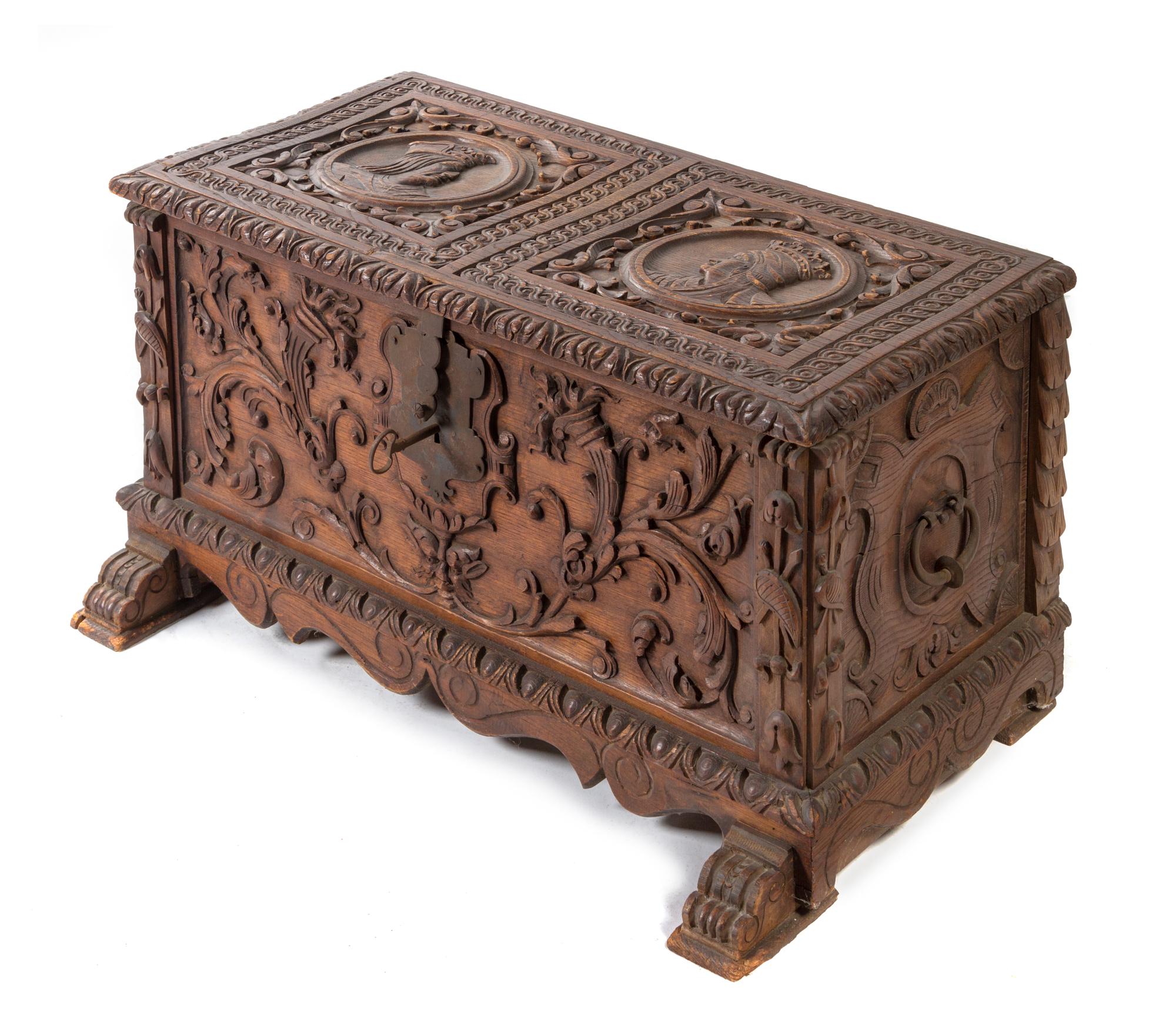 A Renaissance Revival Carved Walnut Chest Width 34 1/4 inches. — 19TH CENTURY