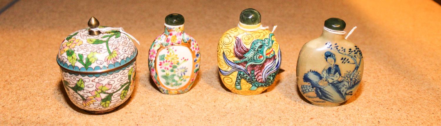 A Group of Three Snuff Bottles Height of tallest 3 1/4 inches.