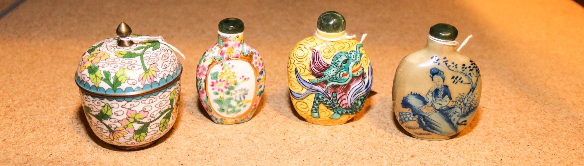 A Group of Three Snuff Bottles Height of tallest 3 1/4 inches.