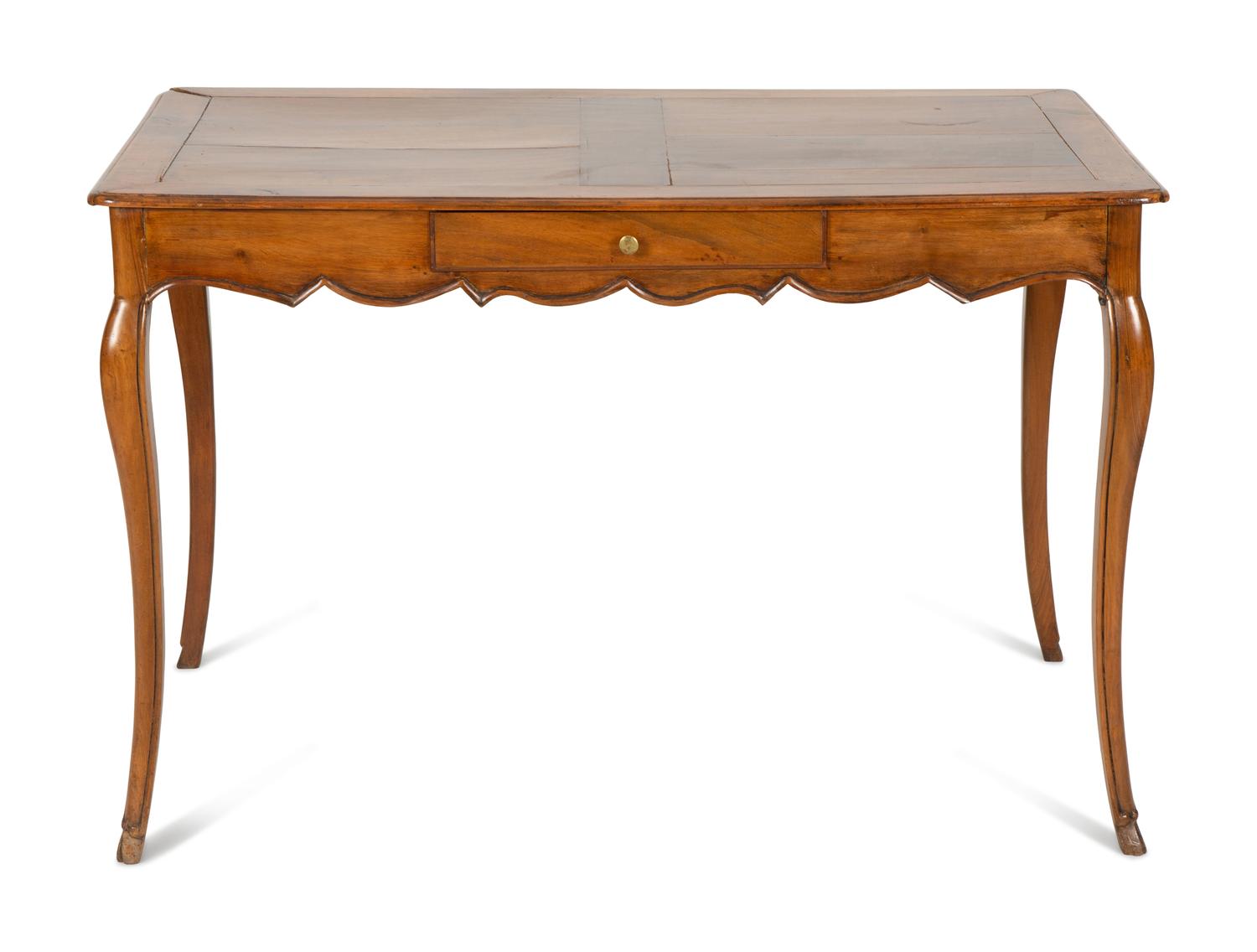 A French Provinical Carved Walnut Writing Table