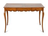 A French Provinical Carved Walnut Writing Table