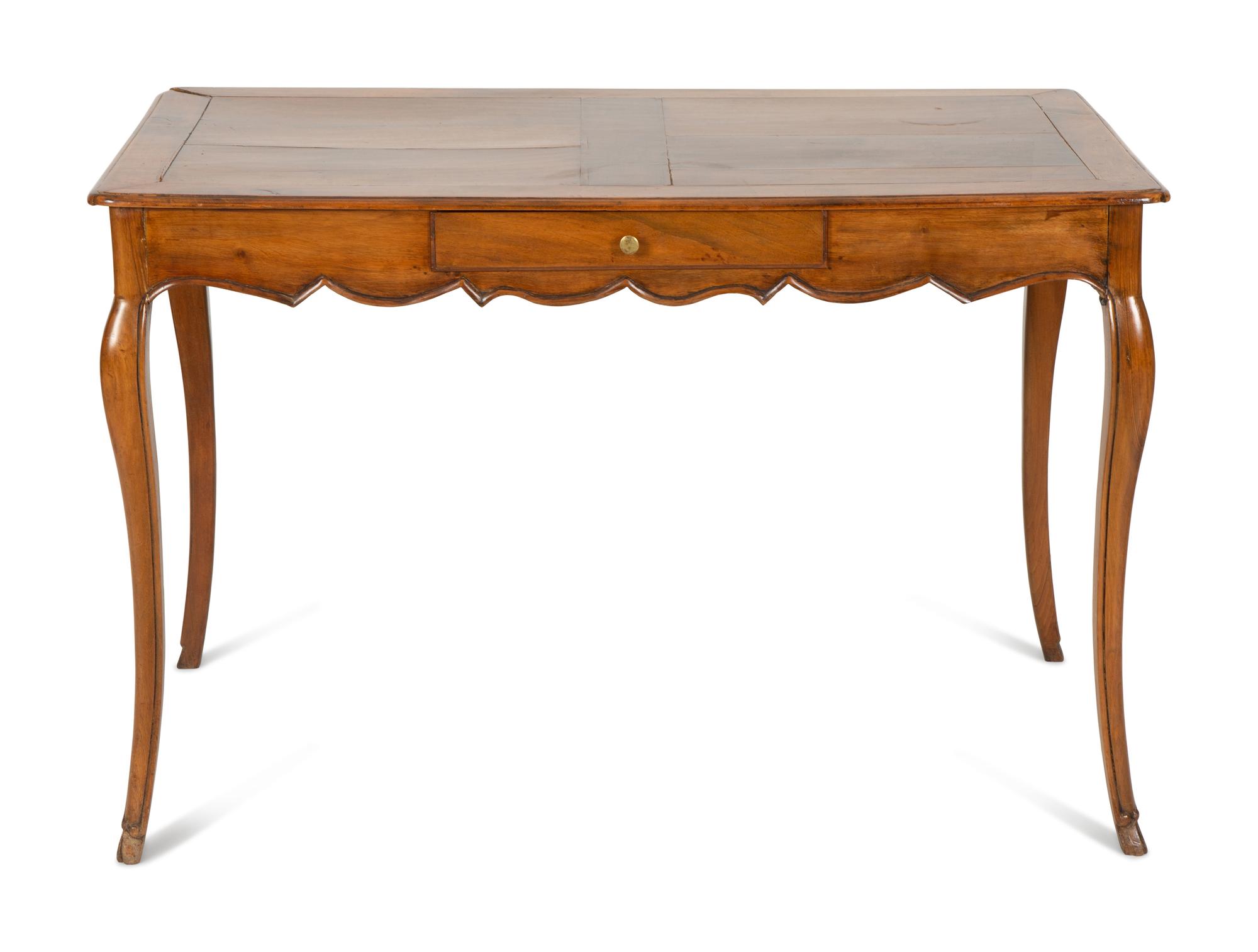 A French Provinical Carved Walnut Writing Table