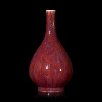 A Chinese Flambé Glazed Porcelain Bottle Vase, Qing Dynasty 清 窯變釉膽瓶