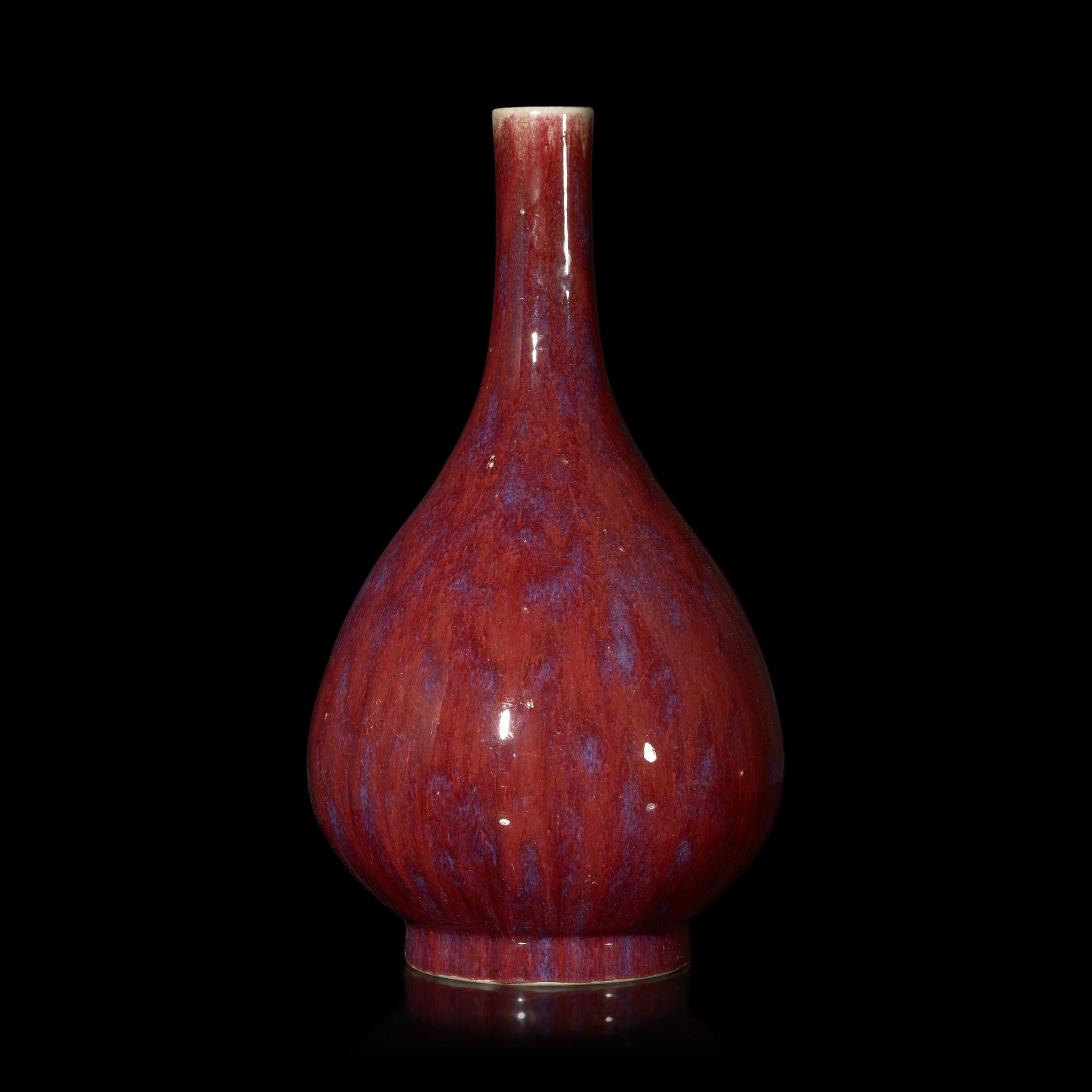 A Chinese Flambé Glazed Porcelain Bottle Vase, Qing Dynasty 清 窯變釉膽瓶