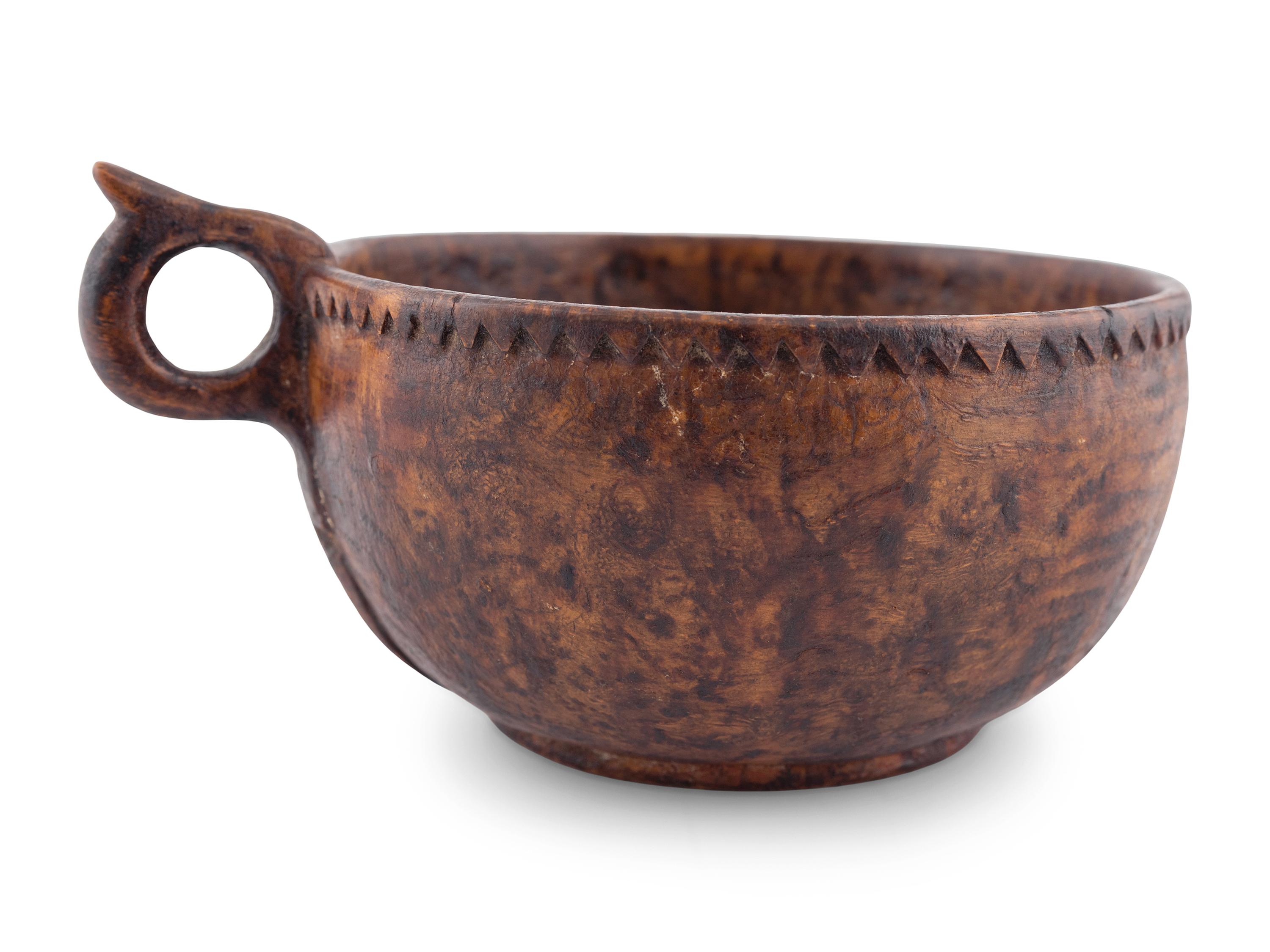 A Finely Turned and Carved Burlwood Cup with Handle