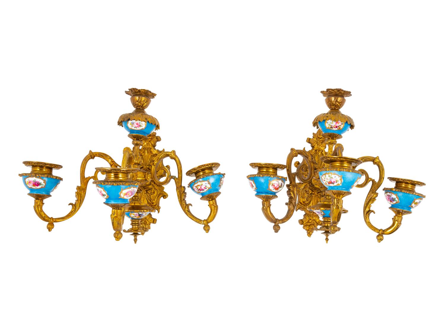 A Pair of Sèvres Style Porcelain and Gilt Bronze Four-Light…