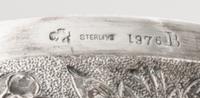A Group of Three American Silver Boxes, , each decorated with floral and foliate decoration, the two smaller examples with engraved mon