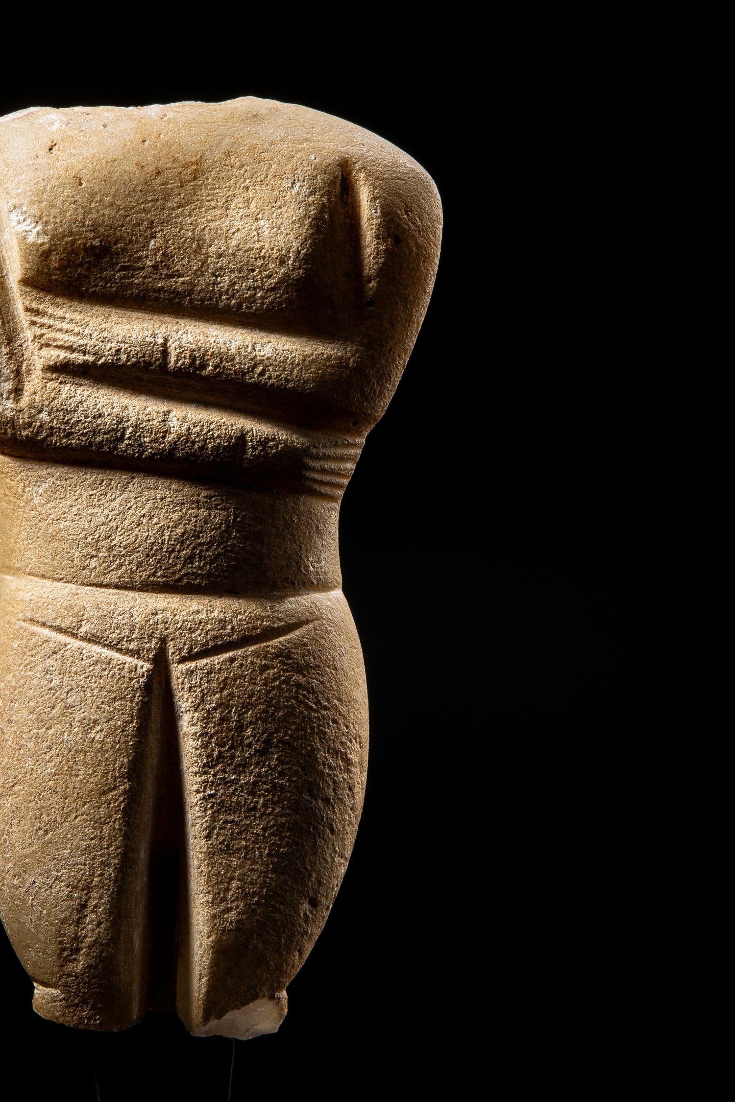 A Cycladic Marble Female Torso