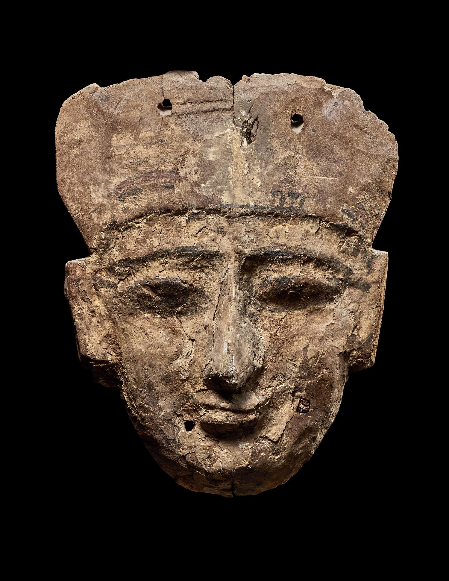 An Egyptian Painted Wood Mummy Mask