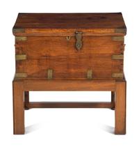 An Anglo-Colonial Brass Mounted Hardwood Campaign Trunk on a Later Stand