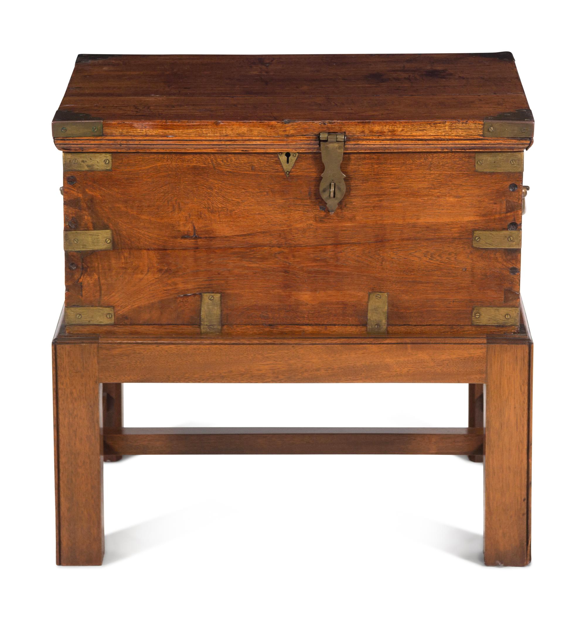 An Anglo-Colonial Brass Mounted Hardwood Campaign Trunk on a Later Stand
