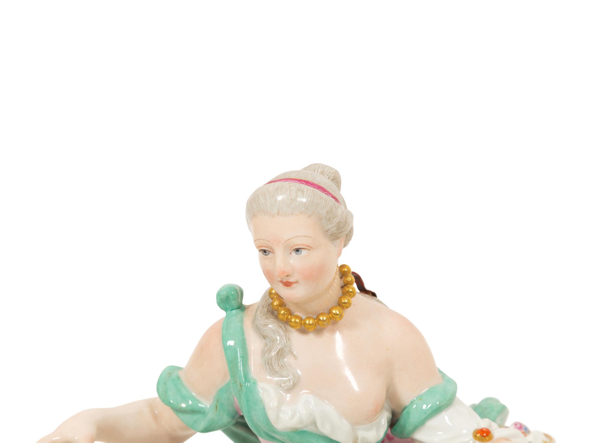 A Pair of German Porcelain Figural Sweetmeat Baskets