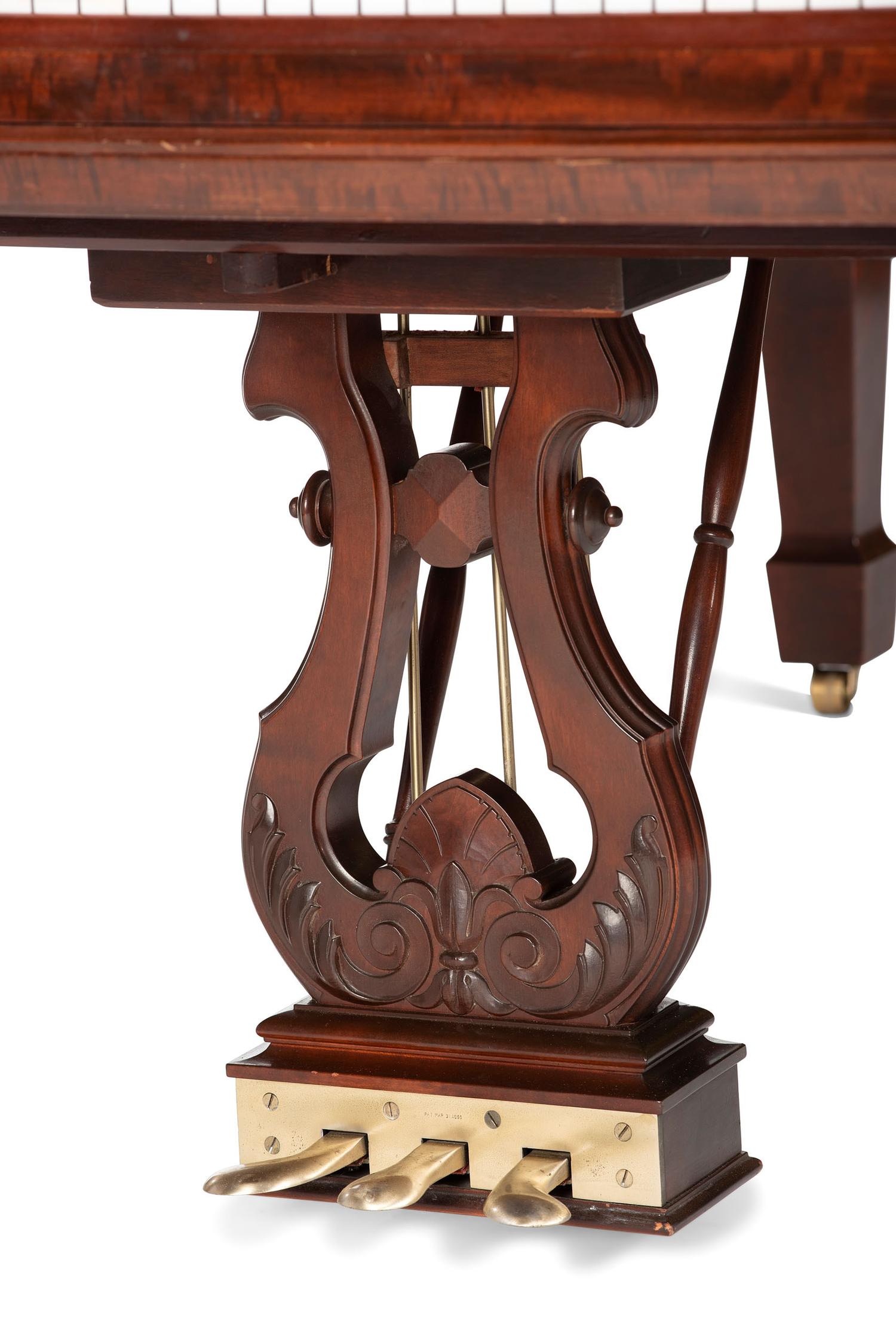A Steinway and Sons Mahogany Baby Grand Piano