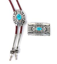 A Navajo Silver and Turquoise Belt Buckle and Matching Bolo, Thomas Singer Height of buckle 2 x width 3 1/2 inches.