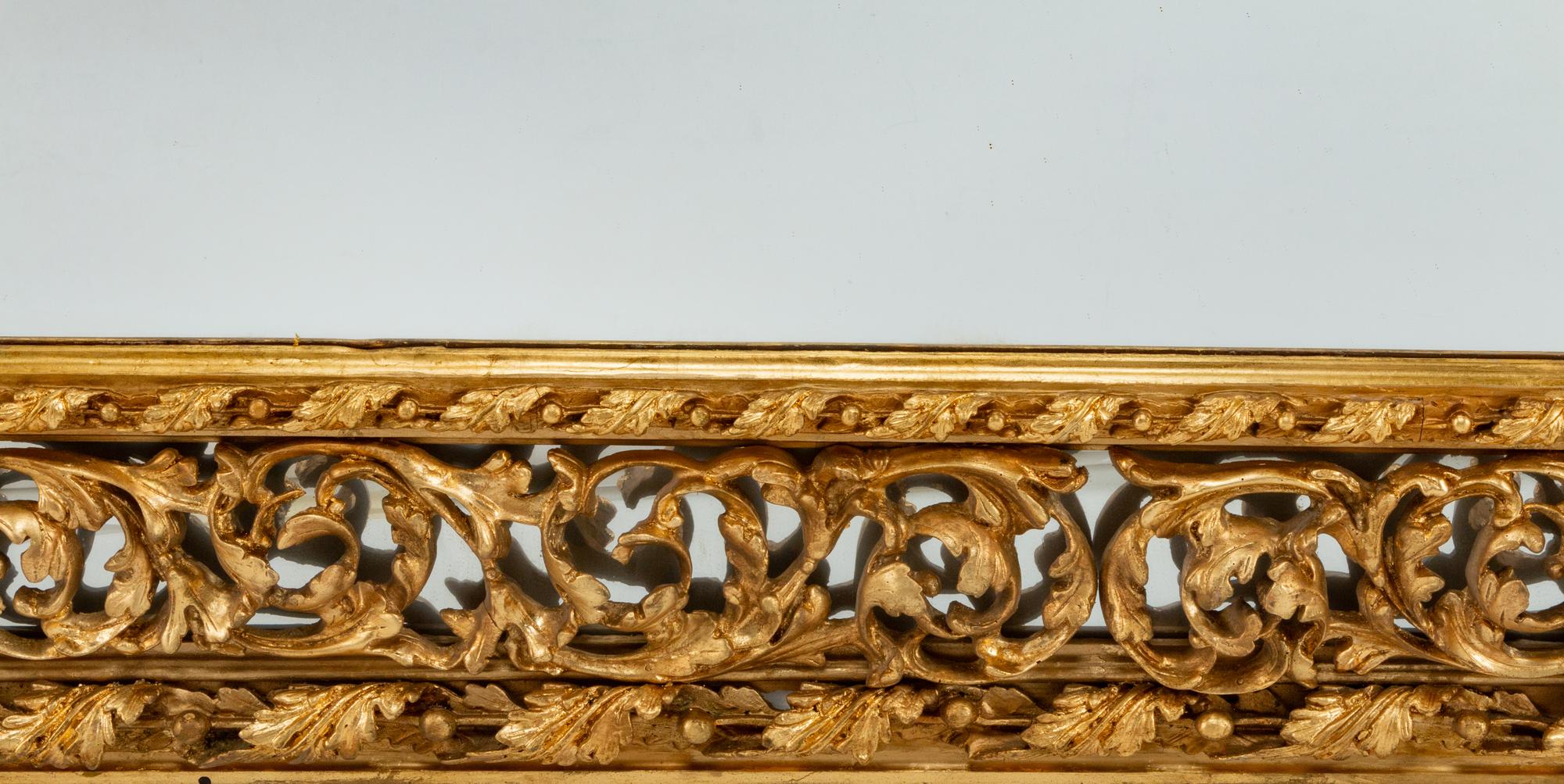 A Pair of Régence Style Giltwood Mirrors
