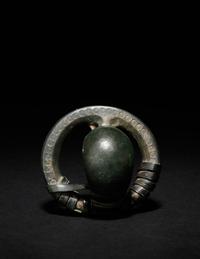 A Celtiberian Bronze Penannular Cupola Fibula