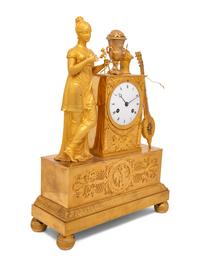 An Empire Gilt Bronze Musical Clock