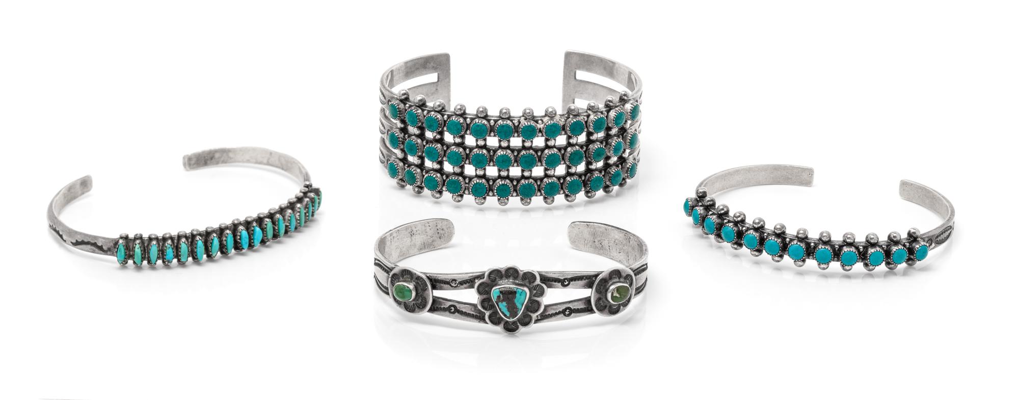 A Collection of Silver and Turquoise Cuff Bracelets,