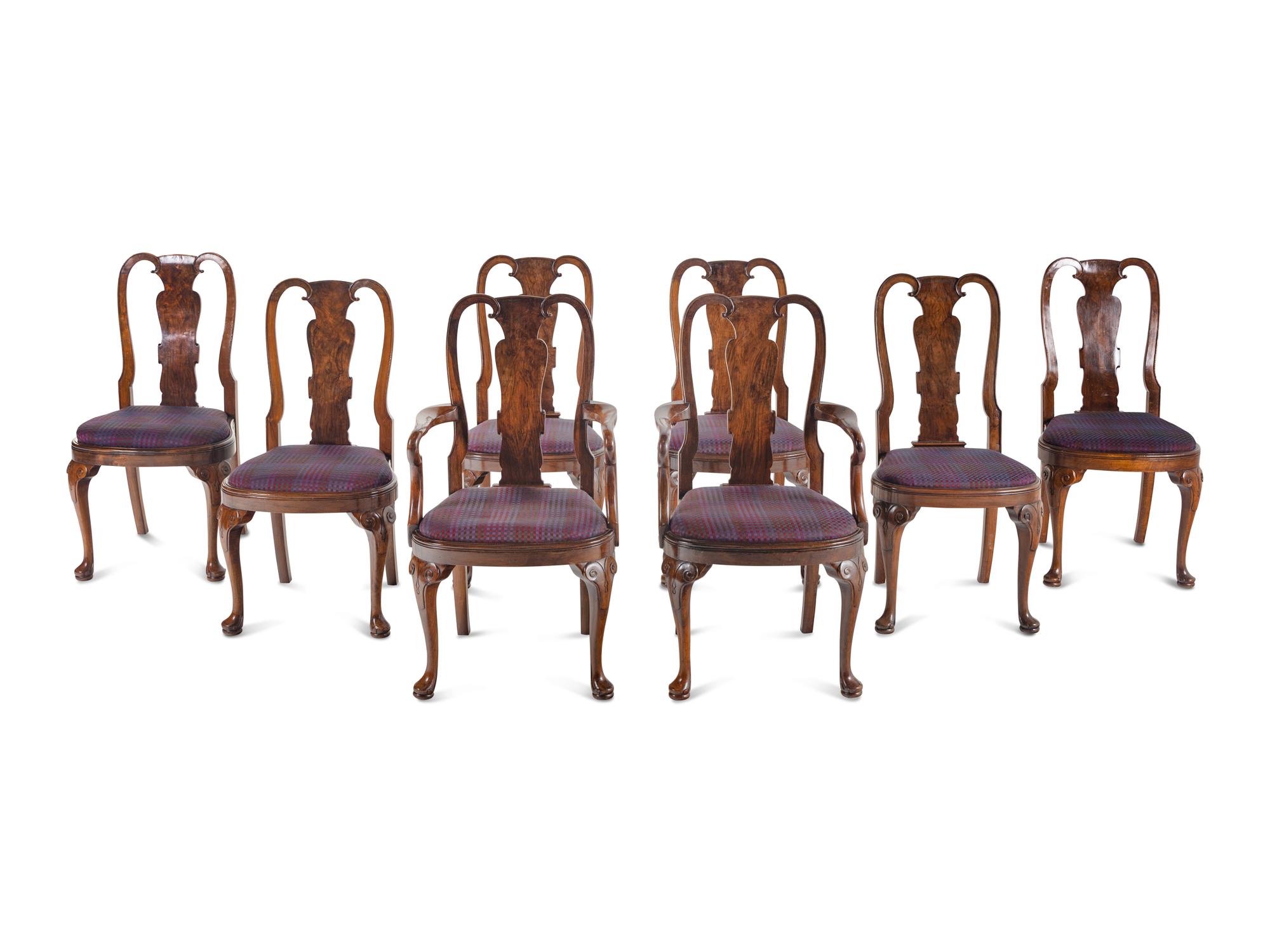 A Set of Eight George I Style Walnut Dining Chairs