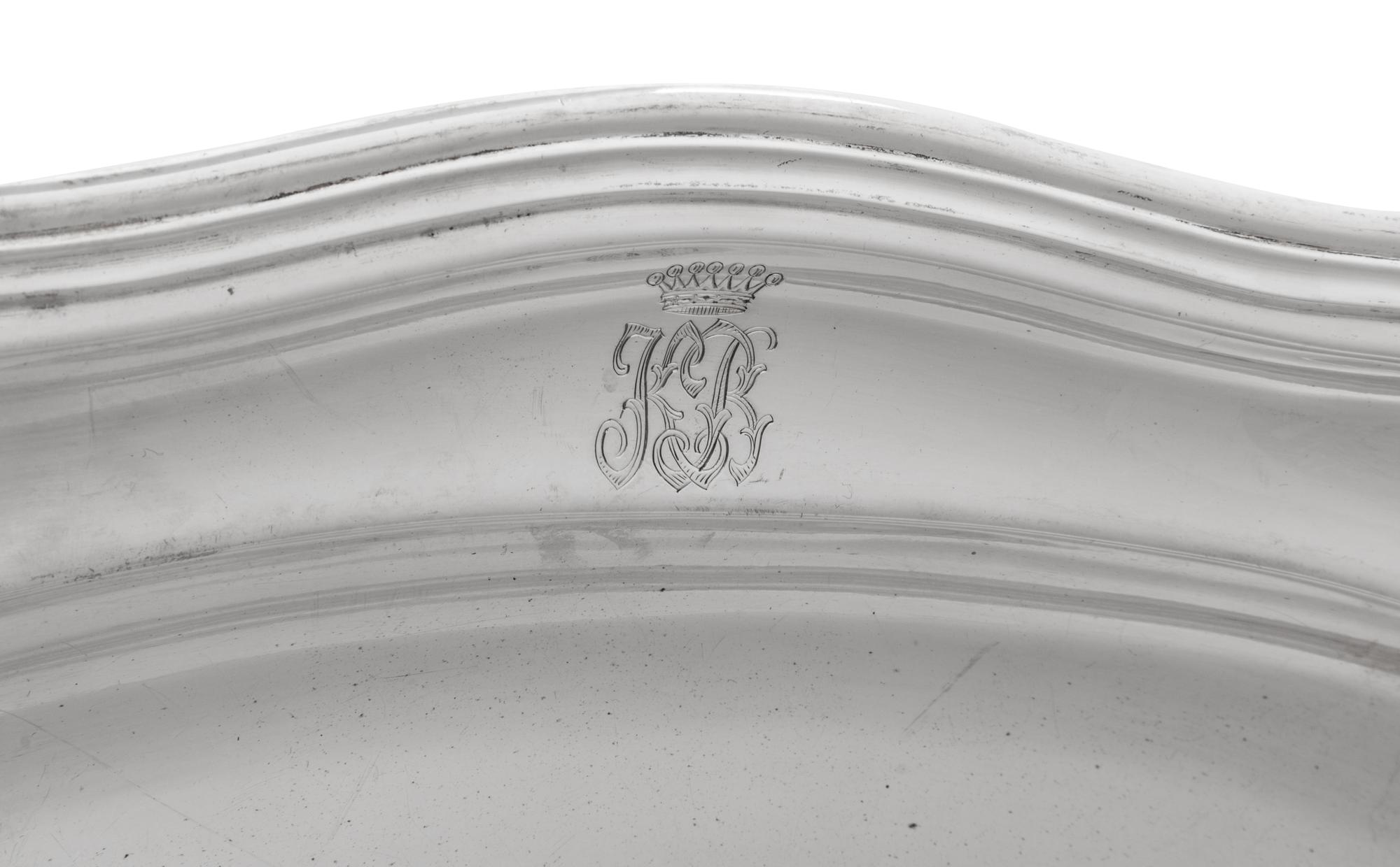 A Near Pair of German Silver Serving Platters