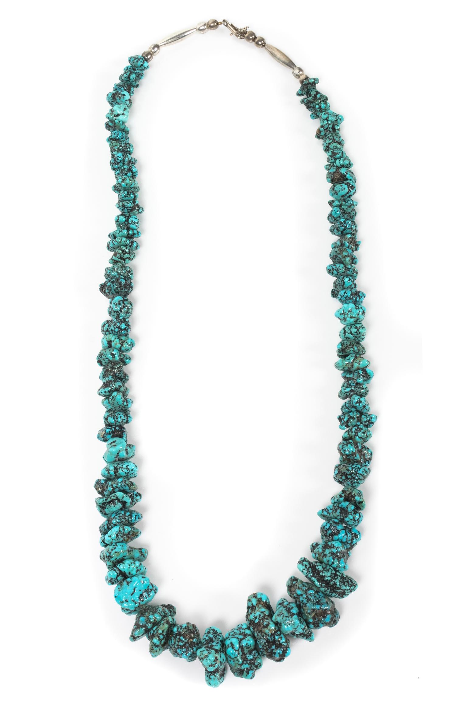 A Graduated Nugget Turquoise Necklace Length 24 inches.