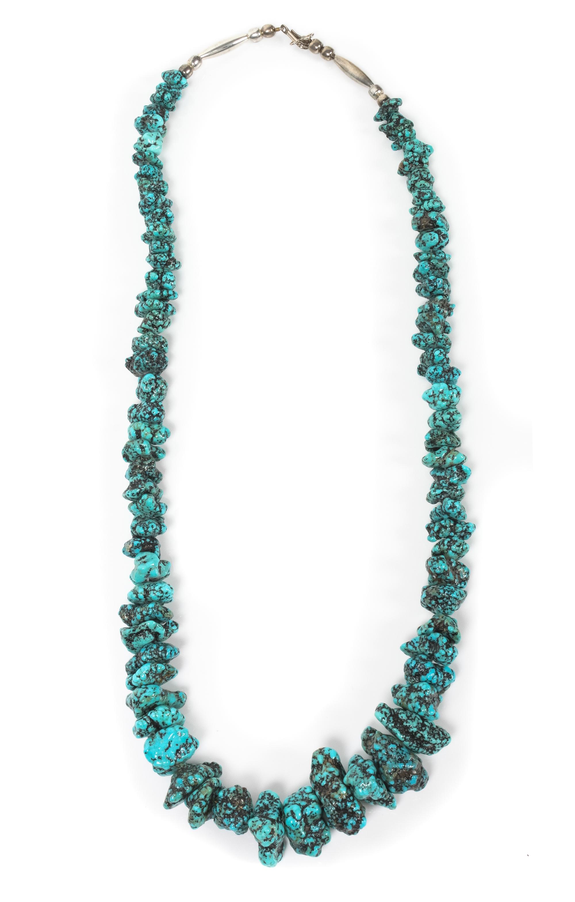 A Graduated Nugget Turquoise Necklace Length 24 inches.