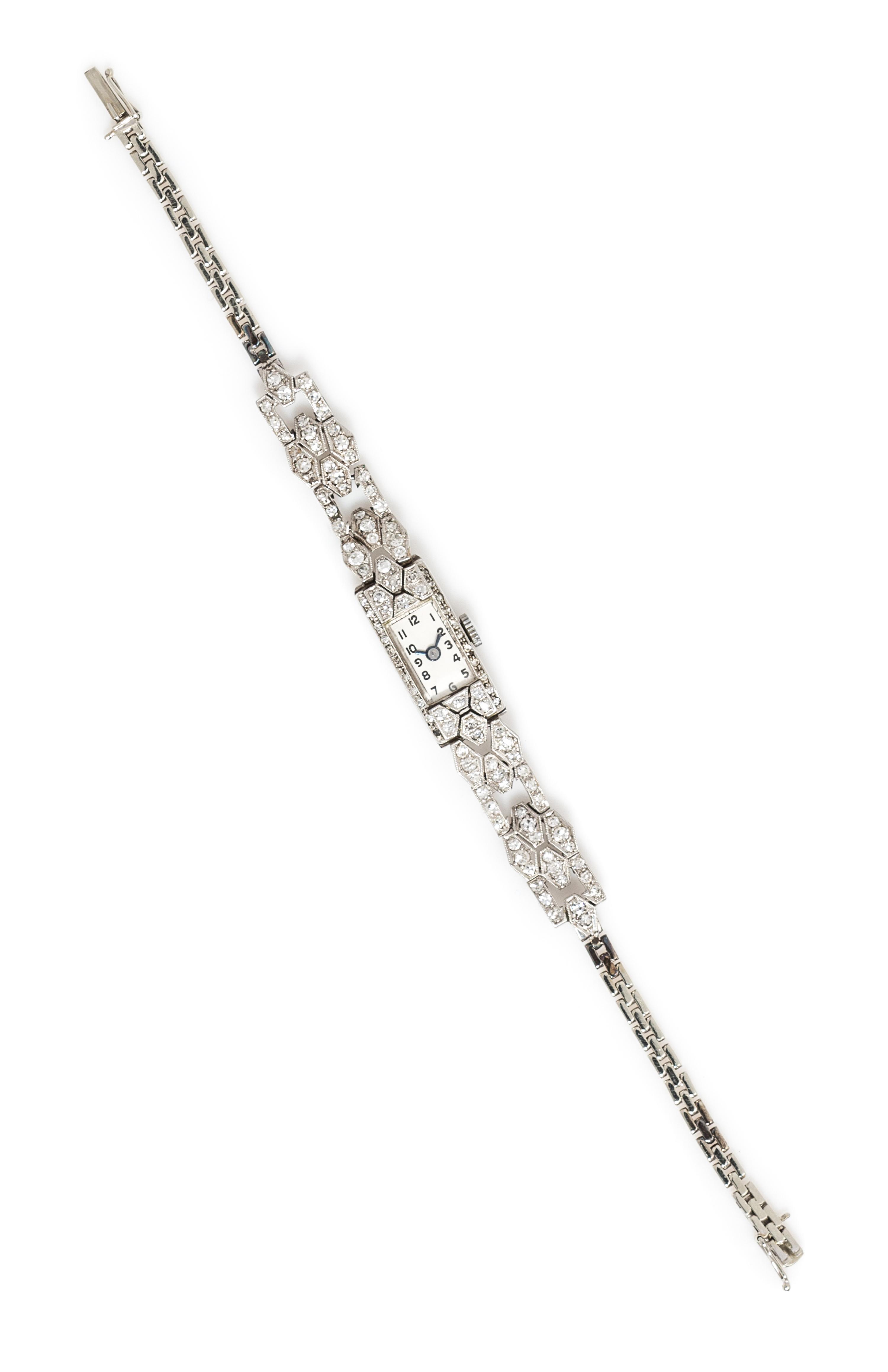A Platinum, 18 Karat White Gold and Diamond Wristwatch, 10.00 dwts.