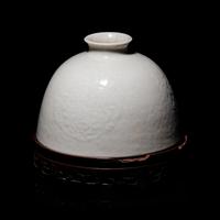 A Chinese White Glazed Soft Paste Porcelain Beehive Water Pot, 18th/19th Century 清中期 白釉暗團花太白尊