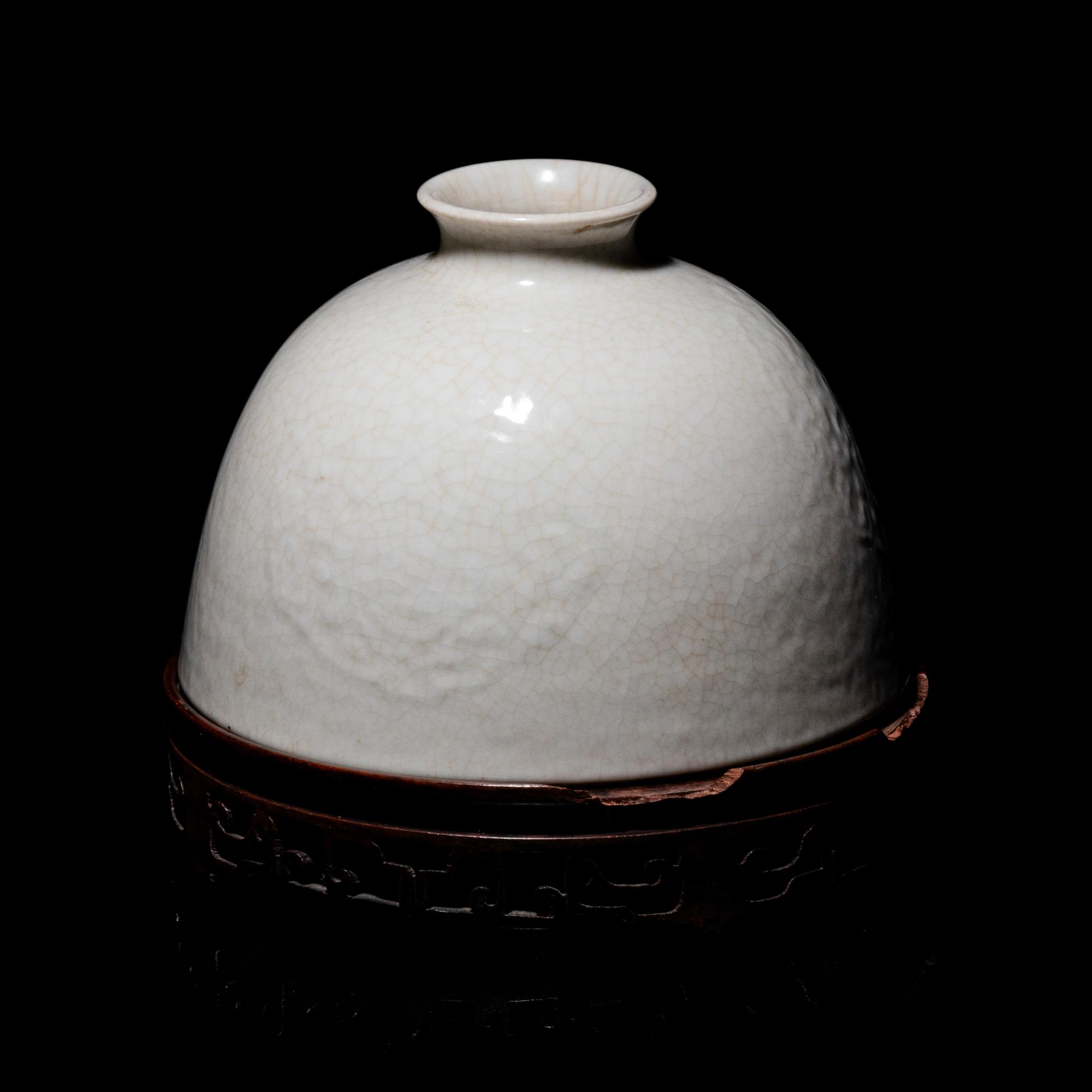 A Chinese White Glazed Soft Paste Porcelain Beehive Water Pot, 18th/19th Century 清中期 白釉暗團花太白尊
