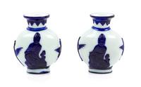 A Pair of Chinese Sapphire-Blue Overlay White Peking Glass Bottle Vases