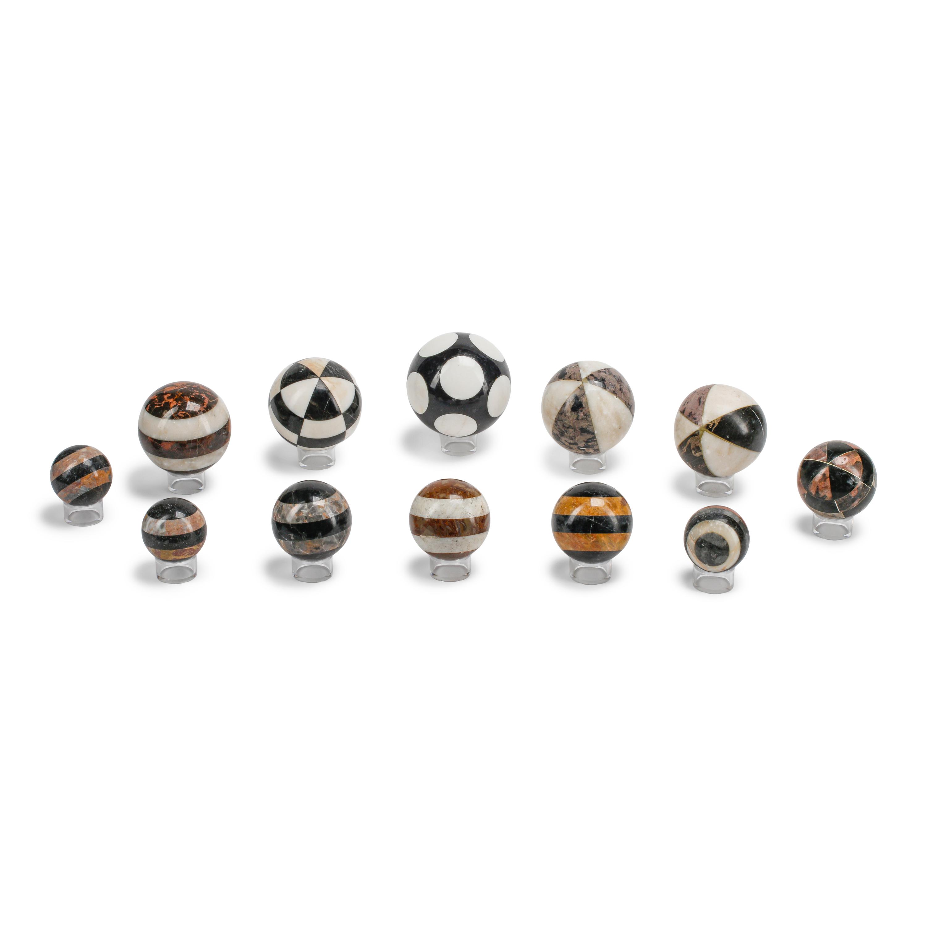 A Set of Twelve Grand Tour Style Marble Spherical Ornaments