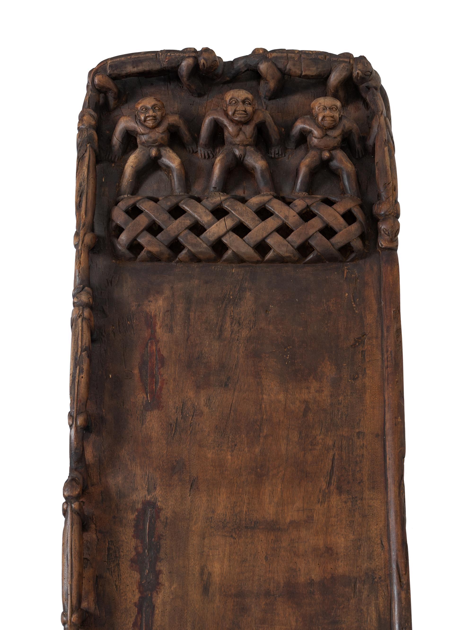 A Bamileke/Bamun Carved Wood Bed