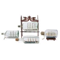 A group of five ships in bottles 19th and 20th century