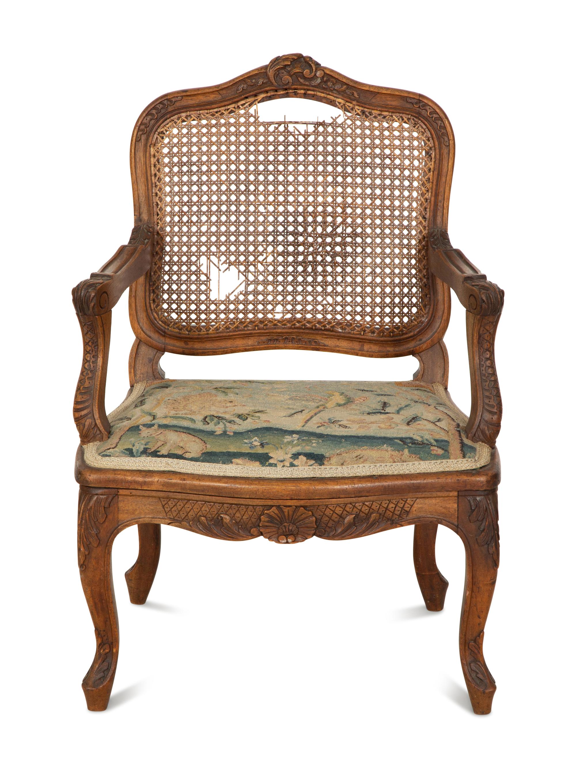 A Louis XV Style Carved Fruitwood Child's Chair