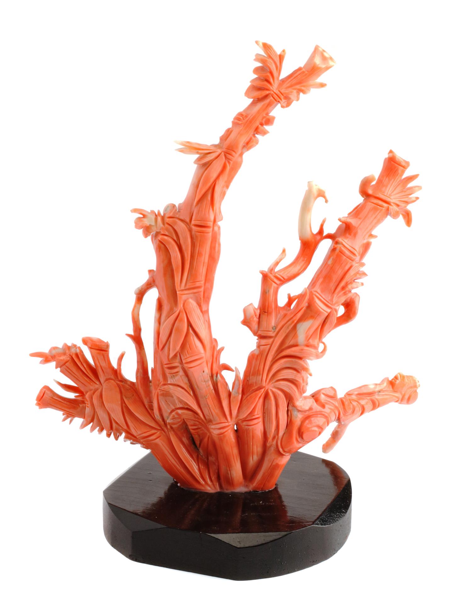 A Chinese Carved Coral Figure Height 8 inches.