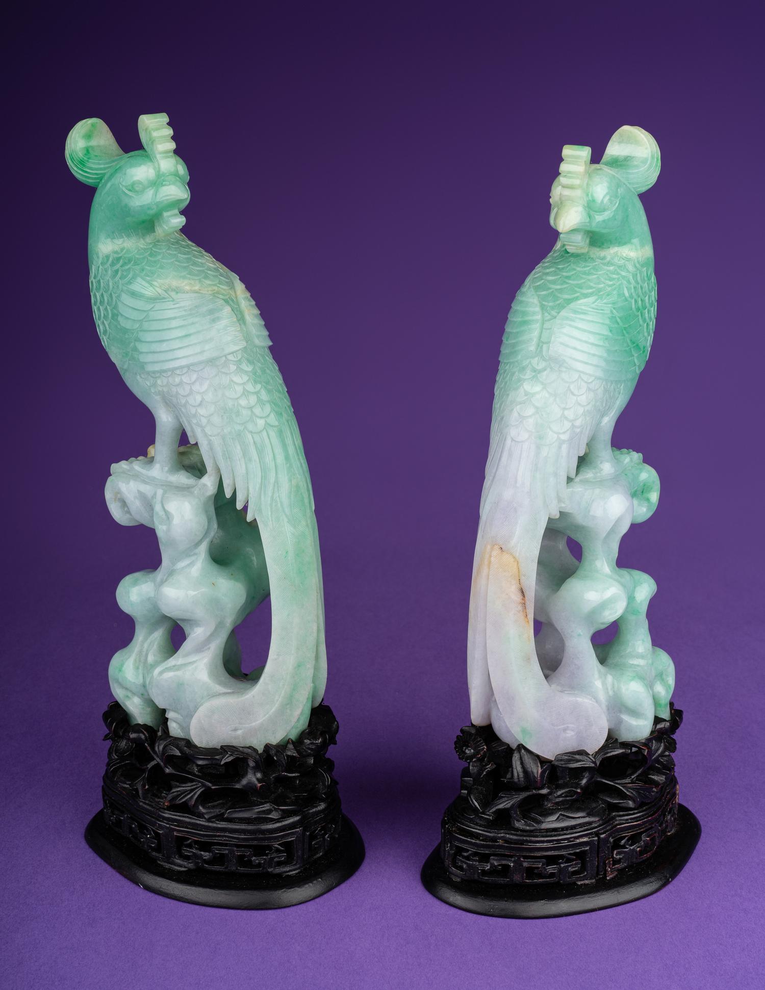 A Pair of Semi-Translucent Green Jadeite Figures of Phoenix