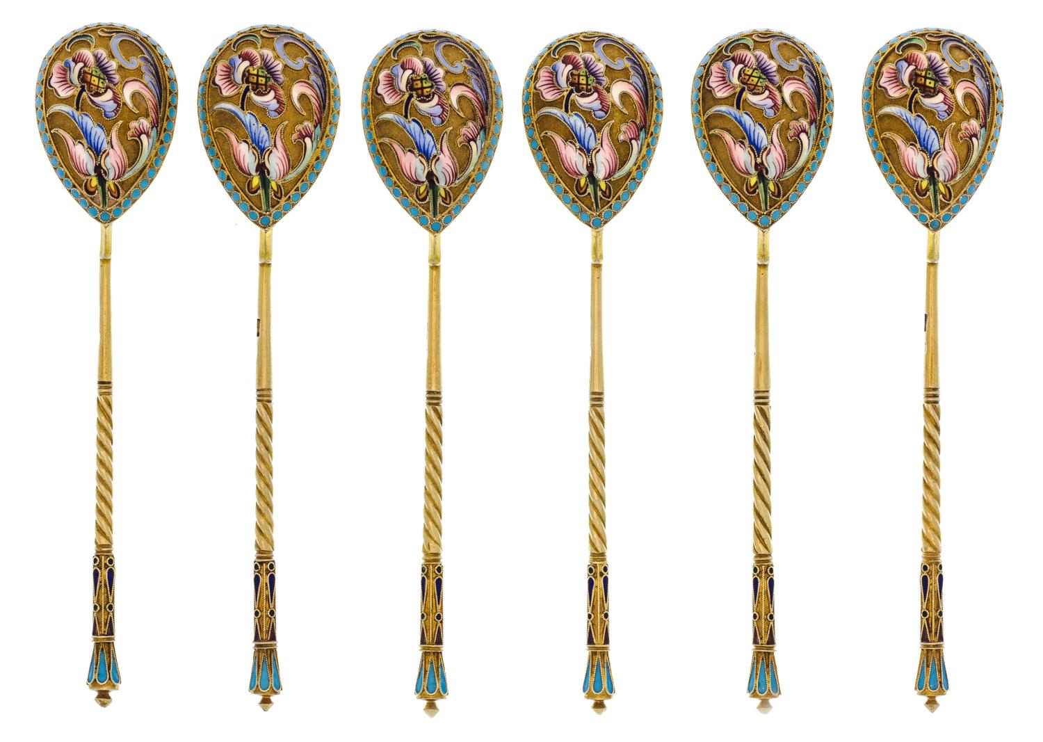 A Set of Six Russian Silver-Gilt and Enamel Spoons, Mark of Maria Semenova, Moscow, early 20th century, each having an enamel finial su