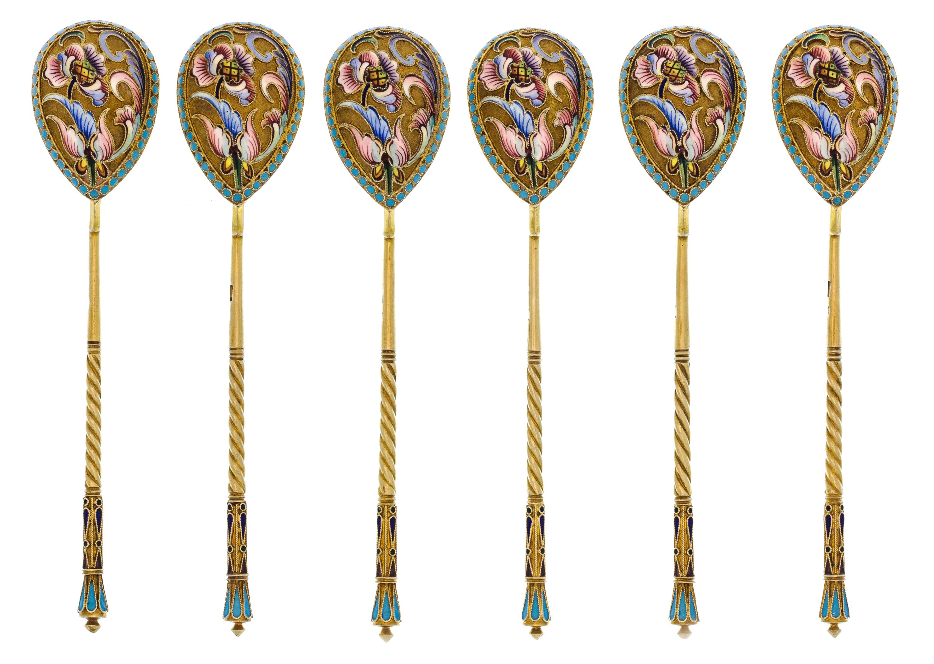 A Set of Six Russian Silver-Gilt and Enamel Spoons, Mark of Maria Semenova, Moscow, early 20th century, each having an enamel finial su