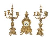 A Louis XV Style Gilt Metal Clock Garniture — LATE 19TH/EARLY 20TH CENTURY