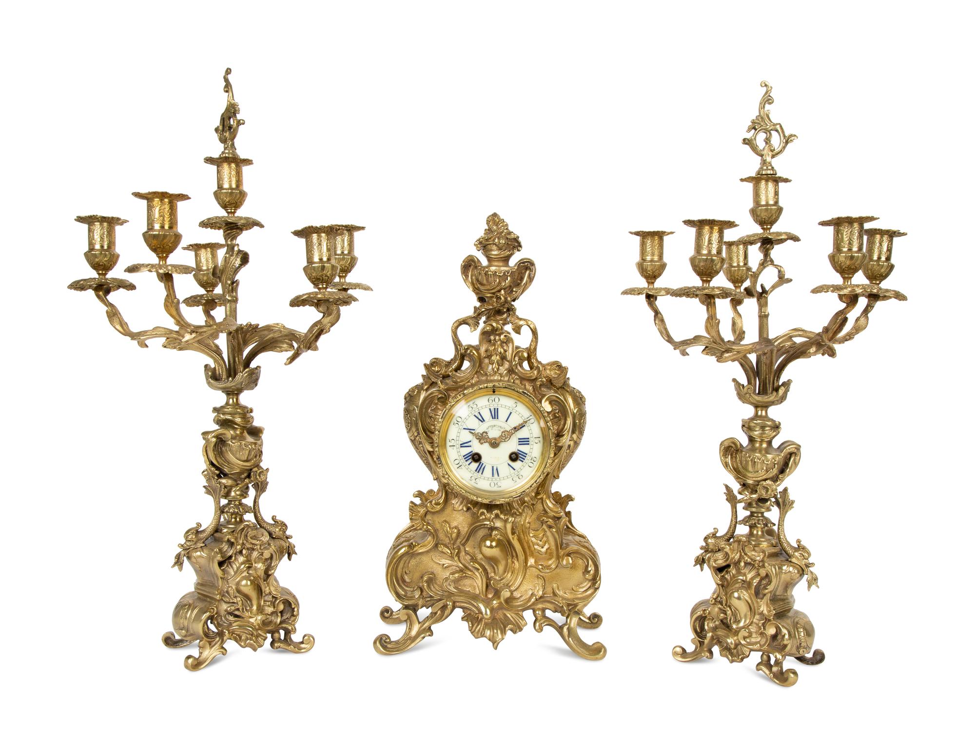 A Louis XV Style Gilt Metal Clock Garniture — LATE 19TH/EARLY 20TH CENTURY